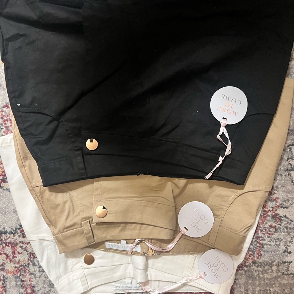 NWT…3 pairs of Women's Skorts in Black, Tan, and Cream.
